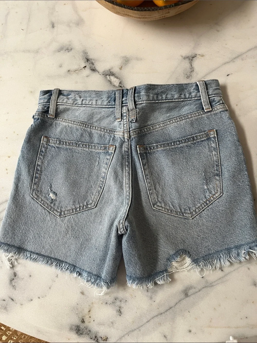 Free People distressed denim shorts